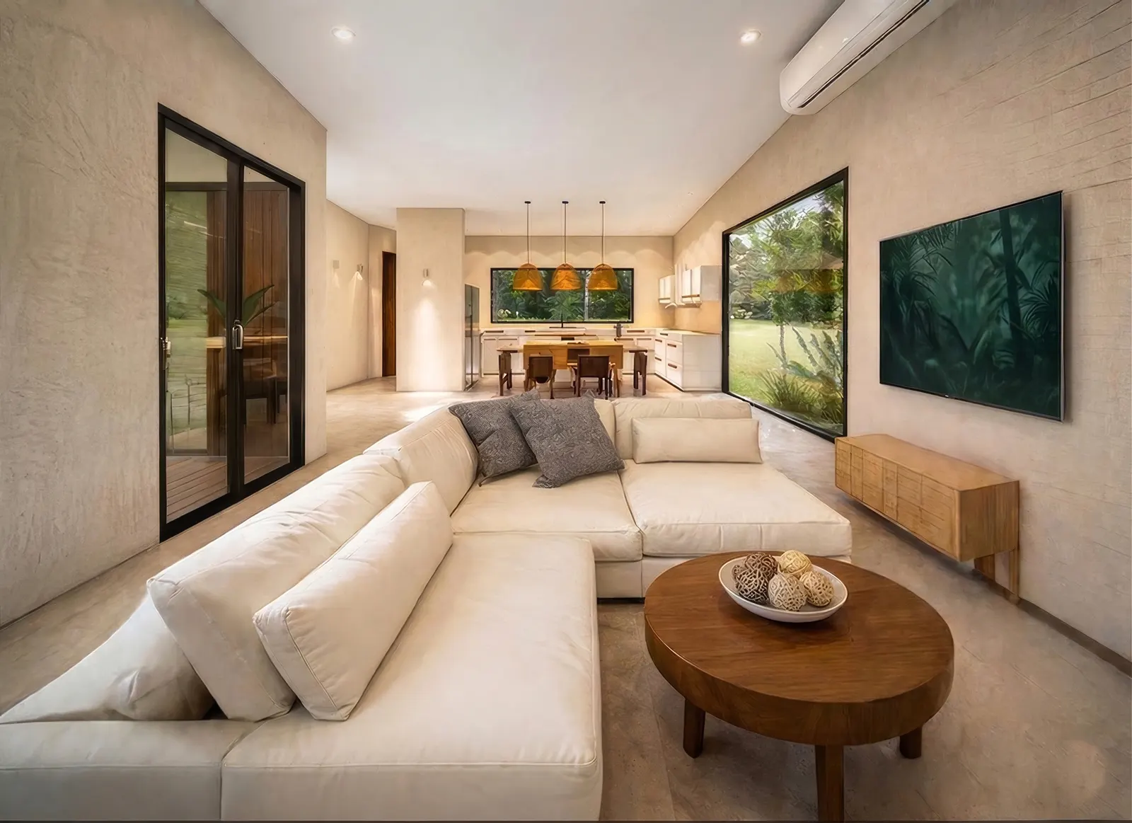 Open-plan living and dining area of Casa Valley with polished floors